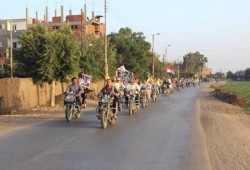مسيرة دراجات بخارية تطوف قرى "سمالوط" رفضًا لبيع مصر
