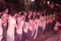 ثوار حوش عيسى يهتفون بإسقاط الانقلاب في مسيرة ليلية