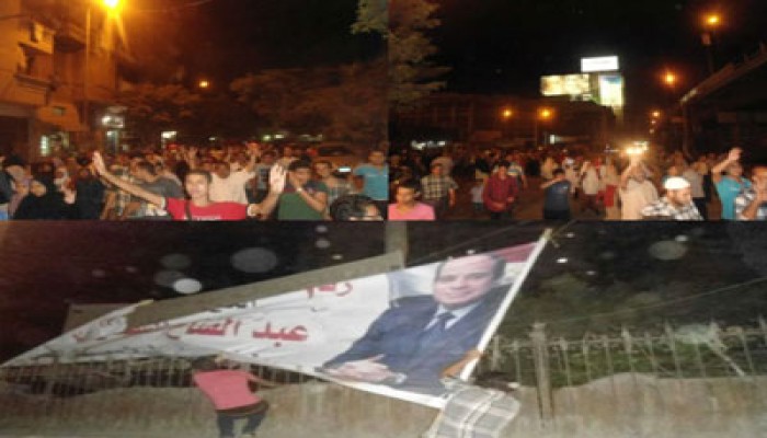 ثوار محرم بك يطالبون بتحرير الرئيس مرسي في مسيرة ليلية