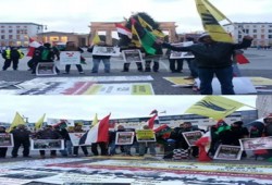 بالصور.. وقفة أمام سفارة فرنسا بألمانيا رفضًا لزيارة السفاح