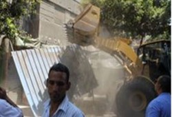 الباعة الجائلون لـ"لشرطة": يحيا مرسي.. وهنشجع الإخوان