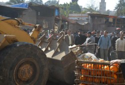 الانقلاب ينهب أكشاك الباعة الجائلين بإبراهيمية الإسكندرية ويغرمهم