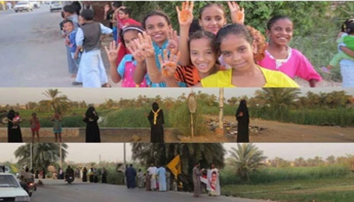 سلسلة بشرية على طريق "إدفو أسوان" استعدادًا لانتفاضة القصاص