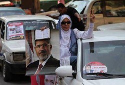 رونالد مايناردوس: مزاعم الإعلام حول ضرورة رحيل الرئيس مرسي كاذبة