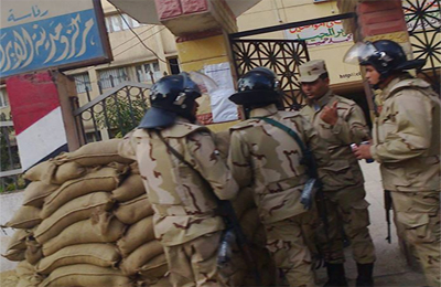 تايم: الاستفتاء في مصر منفصل عن الواقع