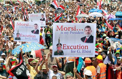 "مراقبو الثورة": "محاكمة" الرئيس مرسي هزلية.. باطلة.. مرفوضة