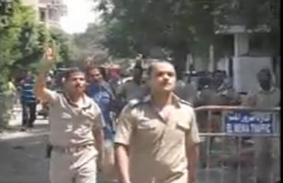 أفراد الشرطة بالمنيا يهتفون "عاوزين مرسي" رفضًا للخصم من رواتبهم