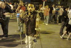 "معوق باعتصام النهضة": سأدافع عن شرعية مرسي حتى يعود أو أموت دونه