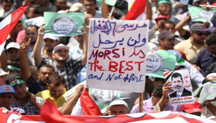 "أقباط المهجر" فرحين بالانقلاب العسكري على الرئيس مرسي