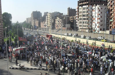 شهيدان من مؤيدي الرئيس بأسيوط وإصابة المئات برصاص الأمن