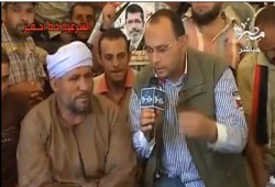 بالفيديو.. صعيدي مسيحي يشارك في اعتصام "رابعة" دعمًا للرئيس مرسي