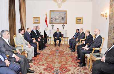 الرئيس مرسي يبحث مع مشعل تطورات ملف المصالحة الفلسطينية