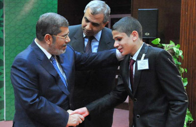 الرئيس مرسي يكرم الفائزين بمسابقة حفظ القرآن للمعاقين ذهنيًّا