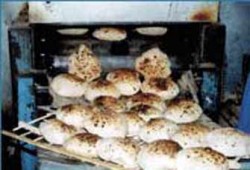 "الحرية والعدالة" يتدخل لحل أزمة الخبز بأبو قرقاص بالمنيا