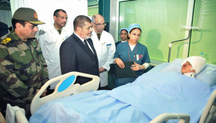 الرئيس مرسي يؤكد تقديم الرعاية لكل المصابين وأهالي شهداء حادث قطار البدرشين