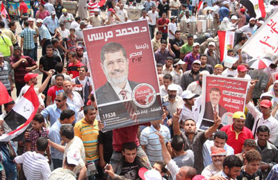 دبلوماسيون وخبراء عرب: فوز مرسي برئاسة مصر أبرز أحداث 2012