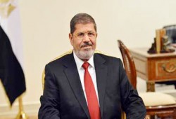 نشطاء "فيس بوك" يعبرون عن سعادتهم بقرارات الرئيس مرسي