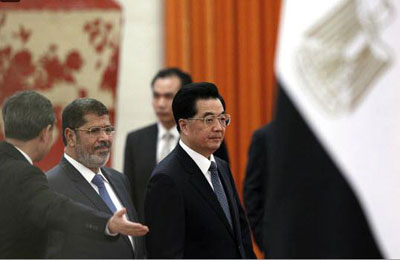 رجال أعمال صينيون: زيارة الرئيس مرسي دفعت مجالات التعاون بين البلدين