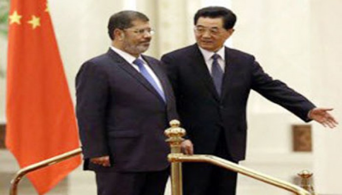 الرئيسان مرسي وهو جين تاو يشهدان توقيع اتفاقات في مجالات التعاون المشترك