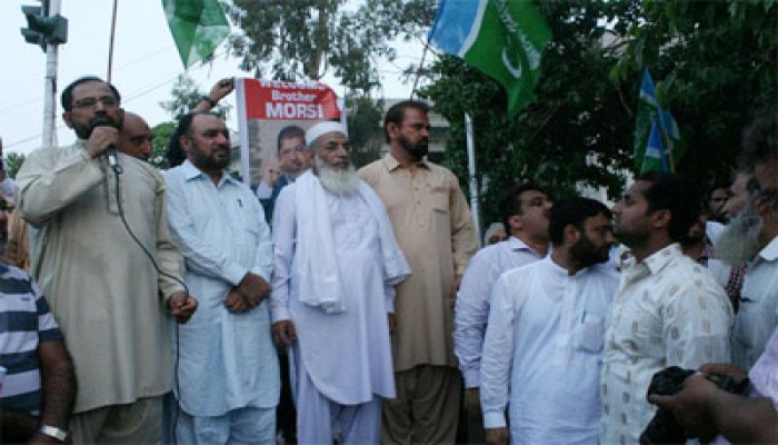 بالصور.. الجماعة الإسلامية بباكستان تحتفل بفوز مرسي