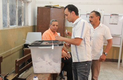 إقبال متوسط في ثاني أيام جولة الإعادة بالجيزة