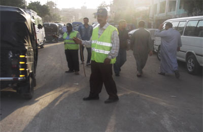 اللجان الشعبية تساهم في تأمين اللجان وتنظيم المرور بالبدرشين