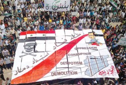 الأسد يعدم 12 عاملاً ويواصل قصف الثوار