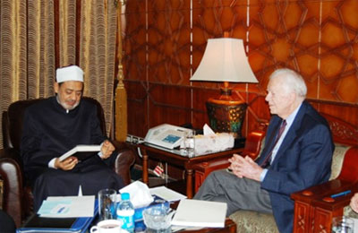 كارتر لشيخ الأزهر: الانتخابات المصرية نموذج يُحتذى به