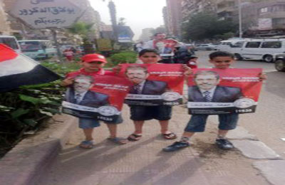 الجيزة.. سلسلة بشرية بالمهندسين دعمًا لمرسي