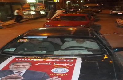 مسيرة سيارات لدعم د. مرسي في ملوي بالمنيا