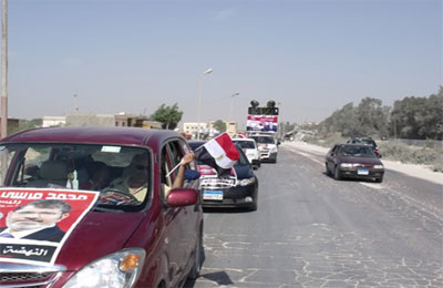 مسيرة بالسيارات بطريق الساحل الشمالي لدعم د. مرسي