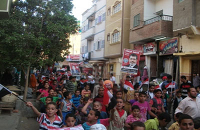 الفيوم.. مسيرة للأطفال بسنورس لدعم مشروع النهضة