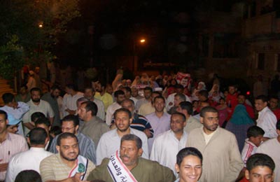 مسيرات وحملات طرق الأبواب لدعم مرسي بالفيوم