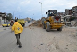 "الحرية والعدالة" يشارك في ترميم شوارع الإسكندرية