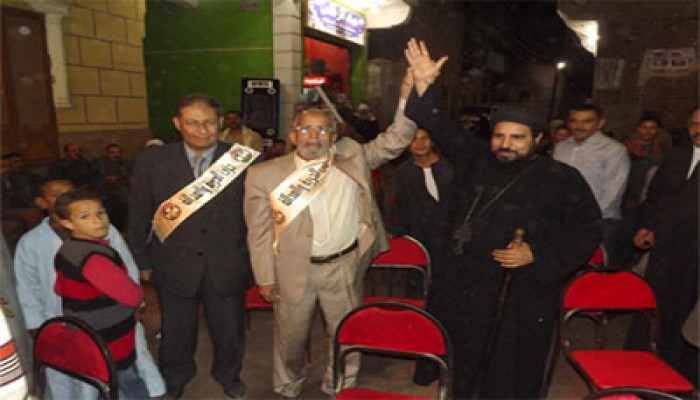 "الأب هدرا" يدعم مرشحي الحرية و العدالة بأسيوط