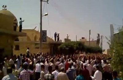 22 شهيدًا بسوريا ومطالب بحماية دولية