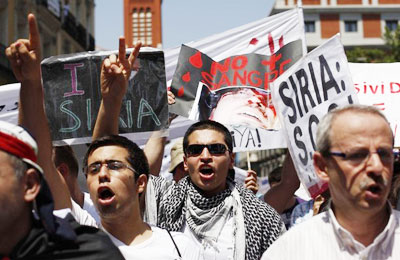 مستقلون يجتمعون بدمشق وفرنسا تهاجم الأسد