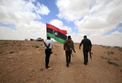 تمويل ثوار ليبيا من أموال القذافي المجمدة