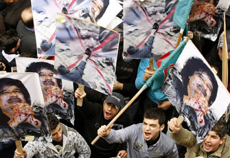 القذافي يشبِّه نفسه بالصهاينة والثوار بحماس