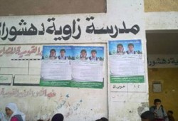 "الوطني" يواصل مخالفة "العليا للانتخابات" بشأن الدعاية