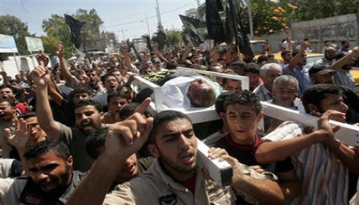 استشهاد وإصابة 4 فلسطينيين بنابلس وأولمرت يلوح بـ"ورقة" القدس