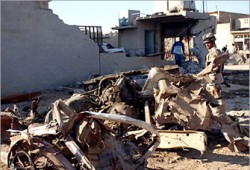 العنف الطائفي يتفاقم ببغداد وبيكر وهاميلتون يدافعان عن تقريرهما