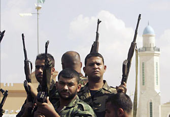 اتفاق بين حماس وفتح على منع مظاهر التسلح بغزة وأنباء عن حكومة جديدة