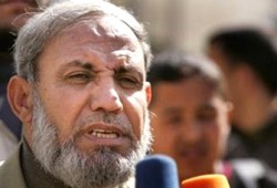 الزهار في ليبيا وأبو مازن يدرس تأجيل الحوار الوطني