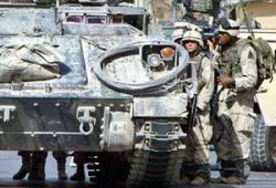 القوات الأمريكية تقتل صحفيًّا.. وتشدد السنة ضد الفيدرالية